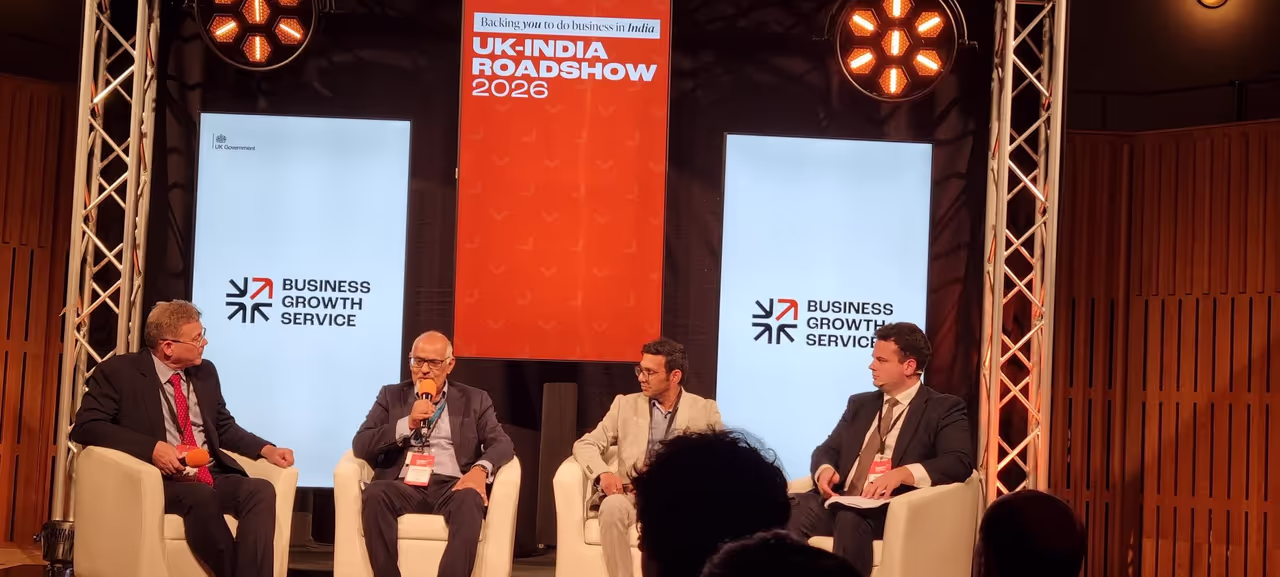 Panel discussion at the UK–India Roadshow 2026 in Leeds — four speakers seated on stage in front of Business Growth Service and UK–India Roadshow banners